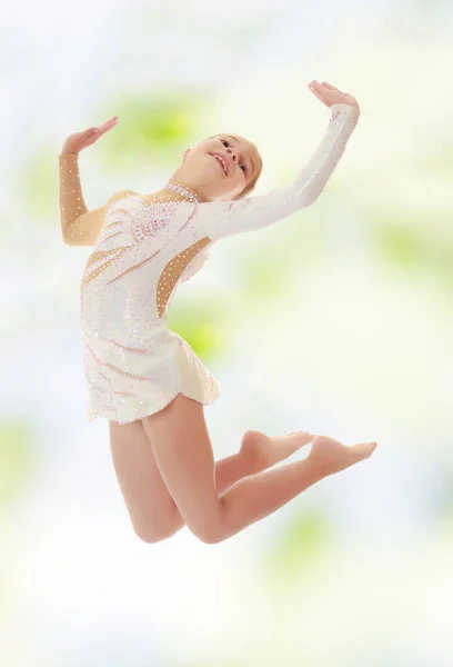 Little gymnast jumping — Stock Photo, Image