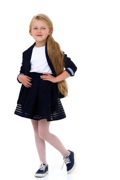 Underbar liten flicka i skoluniform — Stockfoto