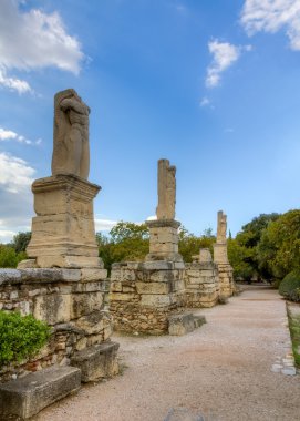 Statues of Giants and Tritons in the Ancient Agora of Athens, Greece clipart