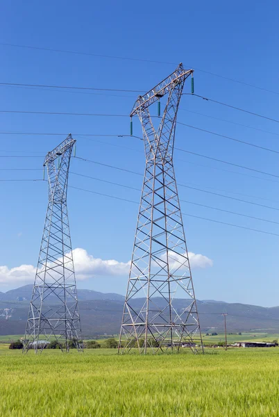 High voltage electricity pylons — Stock Photo, Image