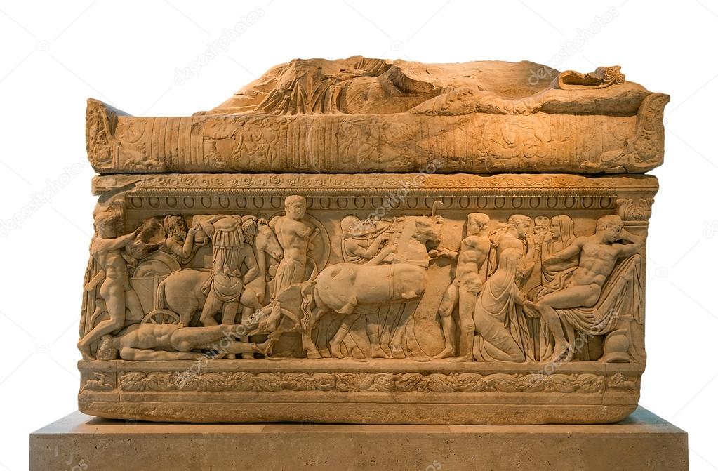 Ancient Greek sarcophagus decorated with scenes from Iliad, isolated