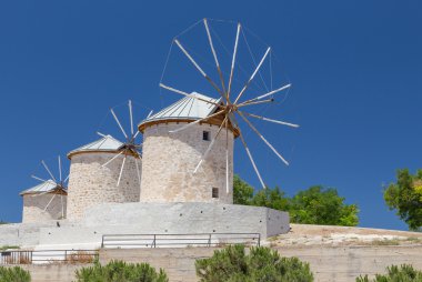 Traditional windmills in Alacati, Izmir province, Turkey clipart