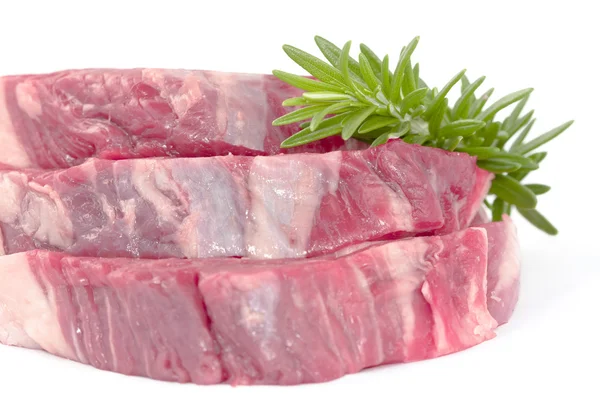 Rosemary on beef fillet steck — Stock Photo, Image