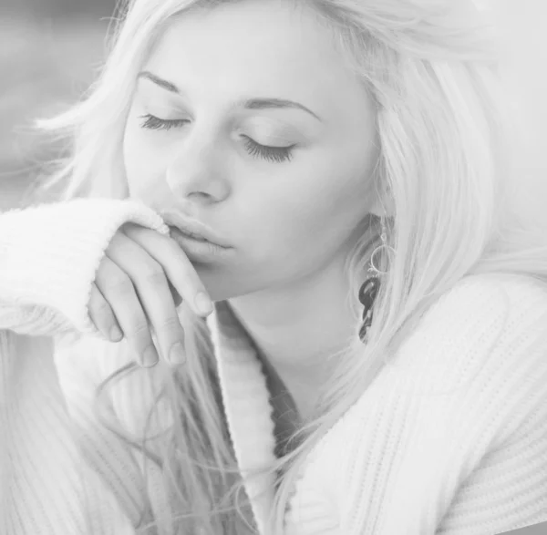 Portrait of a beautiful blonde closeup. Black and white photo — Stock Photo, Image