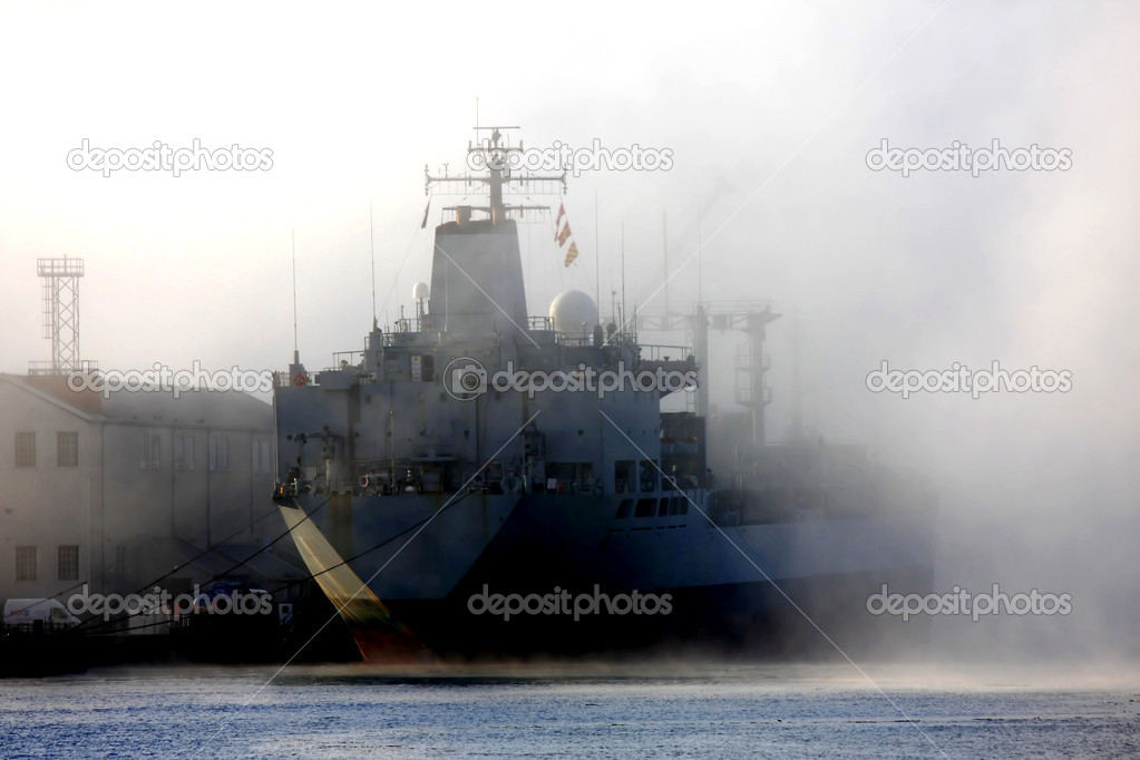 Plymouth with ship in the dock in the misty morning, England