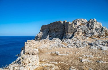 Ruined Feraklos castle overlooking Charaki, Rhodes island, Greece