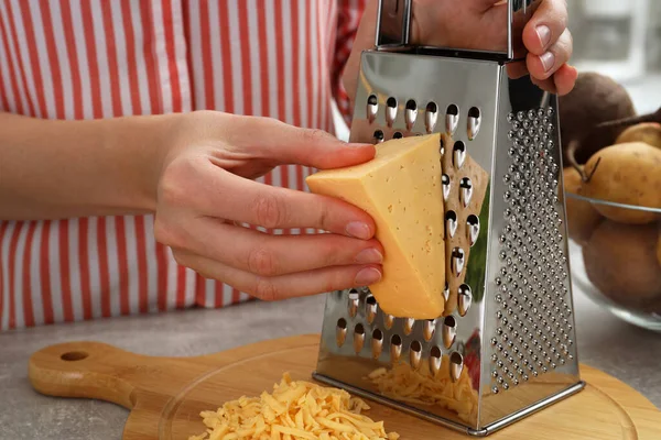Woman Grating Cheese Kitchen Table Closeup — Stock Photo, Image