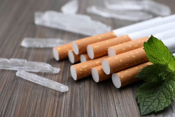 Cigarettes Menthol Crystals Mint Wooden Table Closeup — Stock Photo, Image