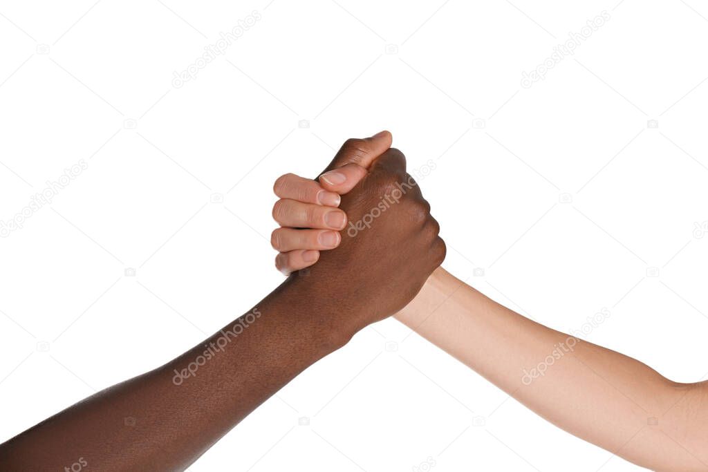 Woman and African American man clasping hands on white background, closeup