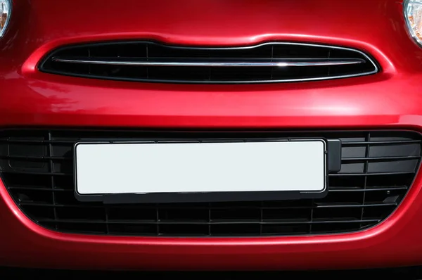 Car with vehicle registration plate, closeup view