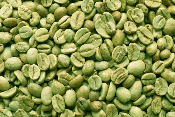 Veel Groene Koffiebonen Als Achtergrond Bovenaanzicht — Stockfoto