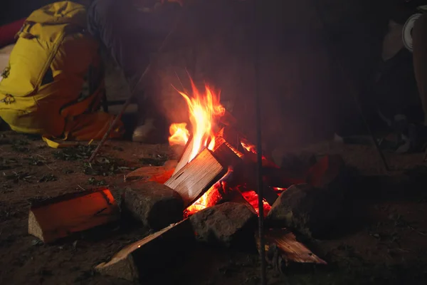 Man Bonfire Outdoors Evening Closeup Camping Season Stock Picture