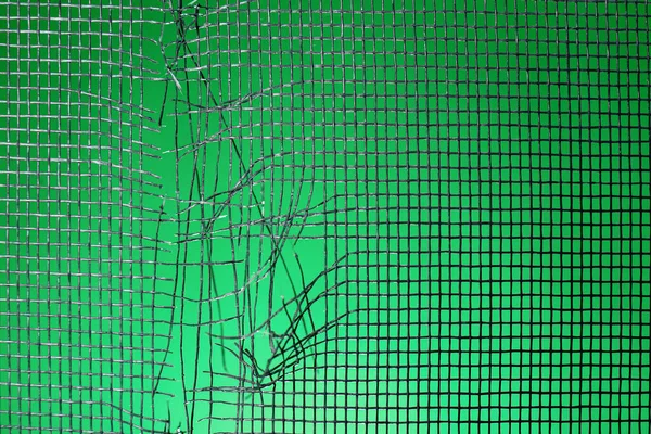 Torn Window Screen Green Background Closeup — Stock Photo, Image