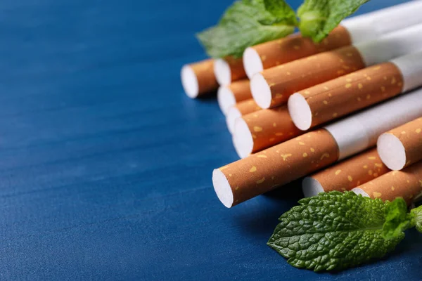Menthol Cigarettes Mint Leaves Blue Wooden Table Closeup Space Text — Stock Photo, Image
