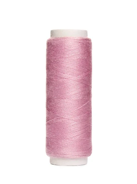 白に隔離されたピンクの縫製糸のスプール — ストック写真