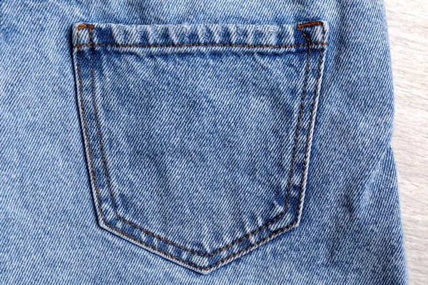 Jeans Azul Claro Elegante Fundo Madeira Branco Close Bolso Traseiro — Fotografia de Stock