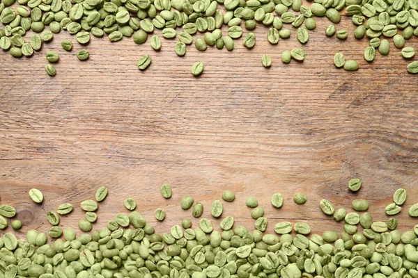 Veel Groene Koffiebonen Houten Tafel Plat Gelegd Ruimte Voor Tekst — Stockfoto