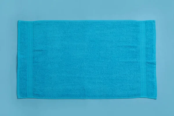 Soft Beach Towel Light Blue Background Top View — Stock Photo, Image