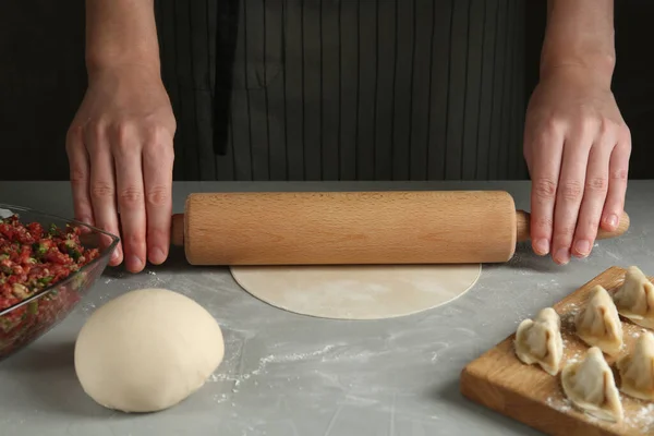 Woman Rolling Dough Gyoza Grey Table Closeup — Stock Photo, Image