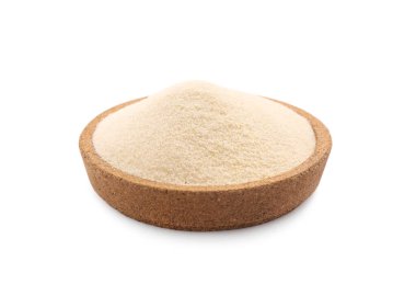 Beyaz kasede pişmemiş organik irmik.