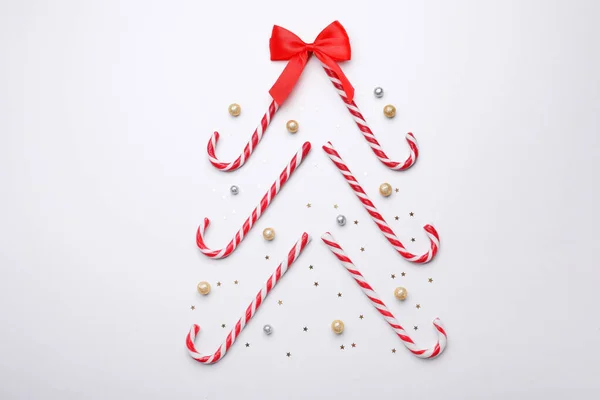 Christmas Tree Shape Made Sweet Candy Canes Festive Decor White — Stock Photo, Image