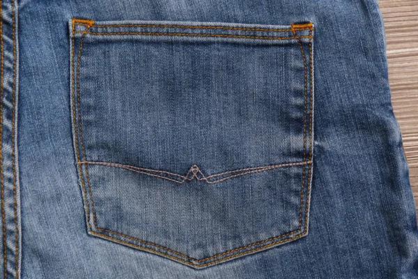 Jeans Azul Claro Elegante Fundo Madeira Close Bolso Traseiro — Fotografia de Stock