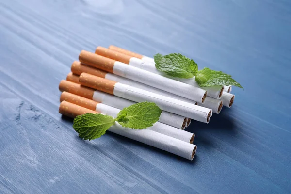 Menthol Cigarettes Mint Leaves Blue Wooden Table — Stock Photo, Image