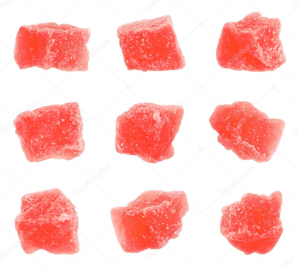 Set with tasty pieces of candied fruits on white background 