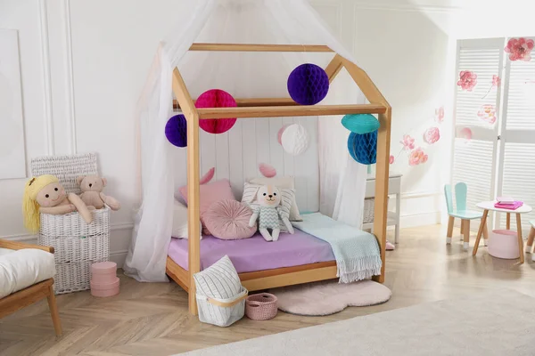 Stylish room for kid with house bed. Interior design