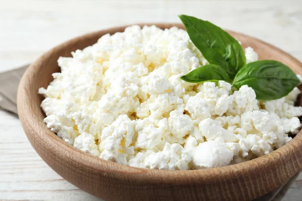 Delicious Cottage Cheese Basil Wooden Bowl White Table Closeup — Stock Photo, Image