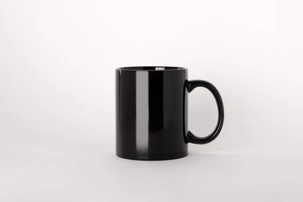 浅色底色空白黑色陶瓷杯 — 图库照片