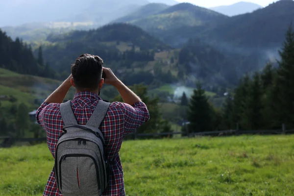 Tourist Backpack Binoculars Enjoying Landscape Mountains Back View — Stock Photo, Image