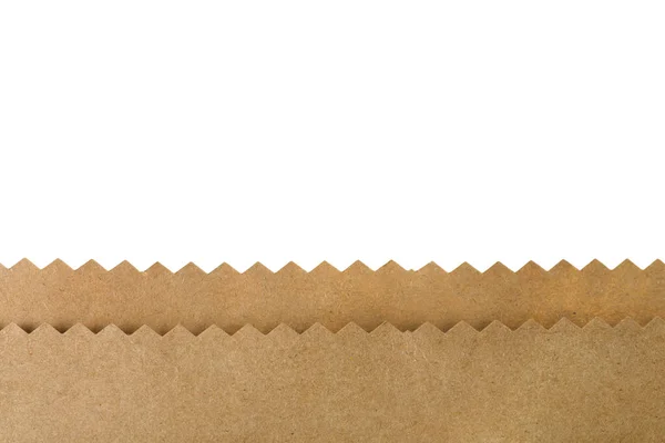 Kraft paper bag on white background, closeup