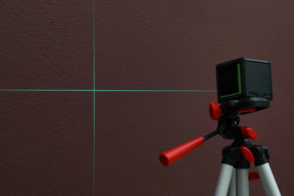 Cross Lines Laser Level Brown Wall — Stock Photo, Image