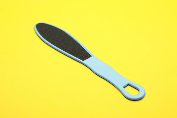 Light Blue Foot File Yellow Background Pedicure Tool — Stock Photo, Image