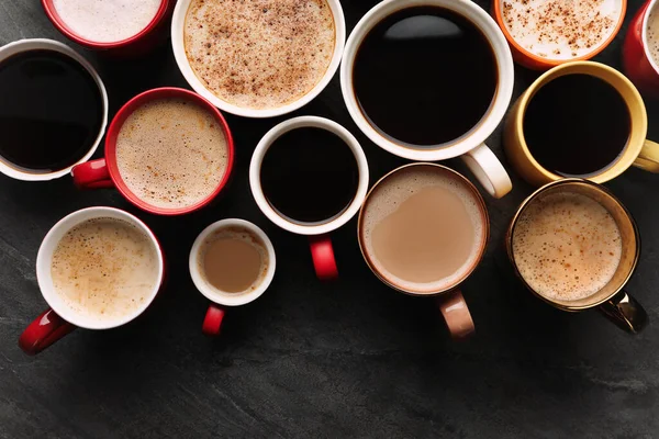 Sok Csésze Különböző Kávét Palaasztalra Lapos Laikus — Stock Fotó