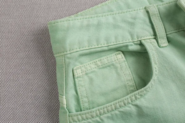 Stylish Light Green Jeans Grey Fabric Closeup Inset Pocket — Stock Photo, Image
