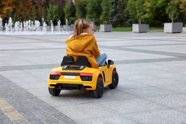 Cute Little Girl Driving Children Car City Street Back View — Stock Photo, Image