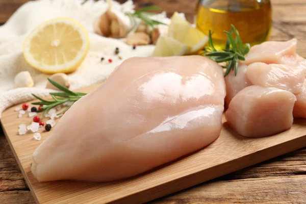 Fresh Raw Chicken Breast Rosemary Spices Wooden Table Closeup — Stock Photo, Image