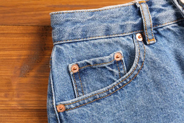Stylish Light Blue Jeans Wooden Background Closeup Inset Pocket — Stock Photo, Image
