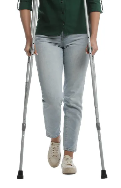 Woman Crutches White Background Closeup — Stock Photo, Image