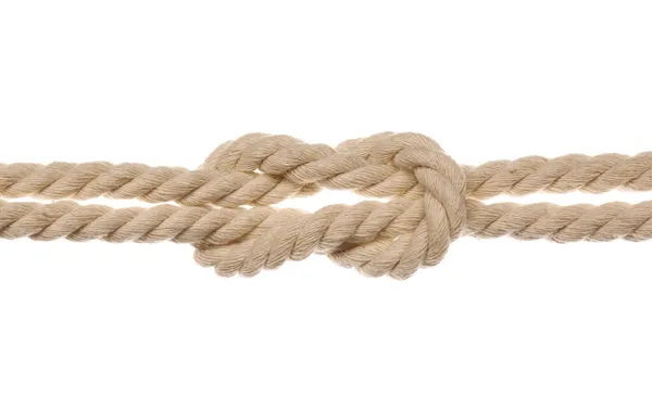 白い背景に正方形の結び目を持つ綿のロープ ストック写真