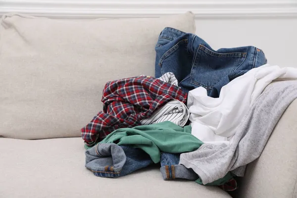 Pile Dirty Clothes Sofa Living Room — Stock Photo, Image