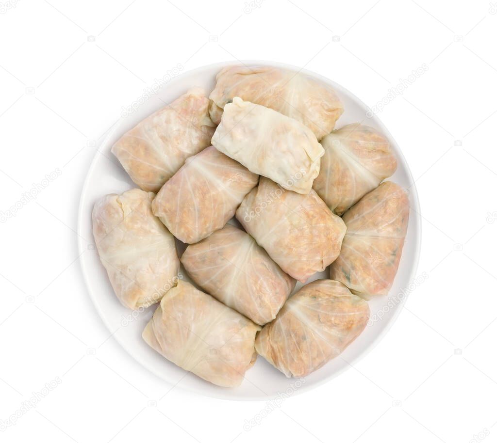 Uncooked stuffed cabbage rolls on white background, top view