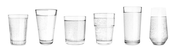 Set with different glasses of soda water on white background. Banner design