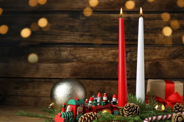 Burning Candles Festive Decor Wooden Table Space Text Christmas Eve — Stock Photo, Image