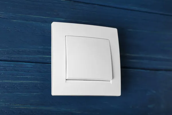 White Light Switch Blue Wooden Background Closeup — Stock Photo, Image