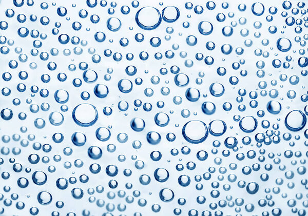 Soda water with bubbles as background, closeup view