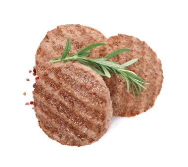 Beyaz arka planda baharatlı ızgara hamburger köfteleri.
