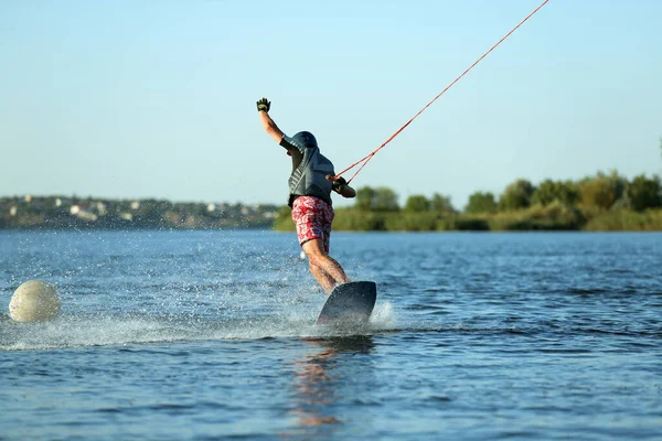 Teenage Boy Wakeboarding River Back View Extreme Water Sport — Stock Photo, Image